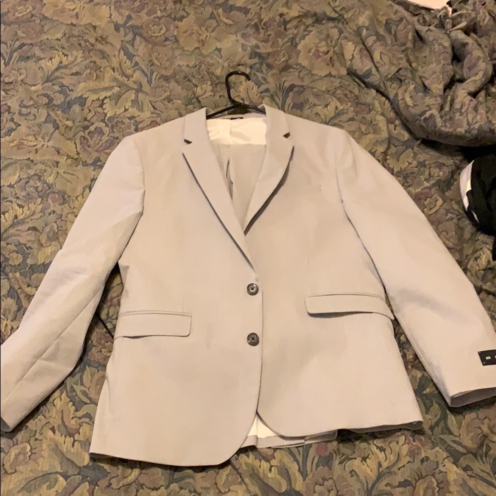 mean grey suit